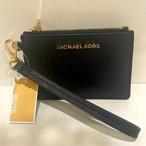 Brand New Michael Korrs Jet Set Travel Coin purse in black leather